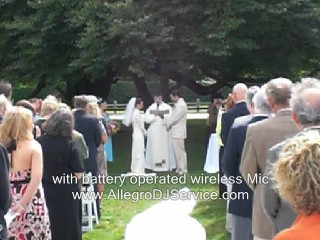 Example of wedding ceremony with a wireless microphone on the wedding officiant.